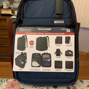 Duchamp Navy Travel Backpack converts to suitcase.